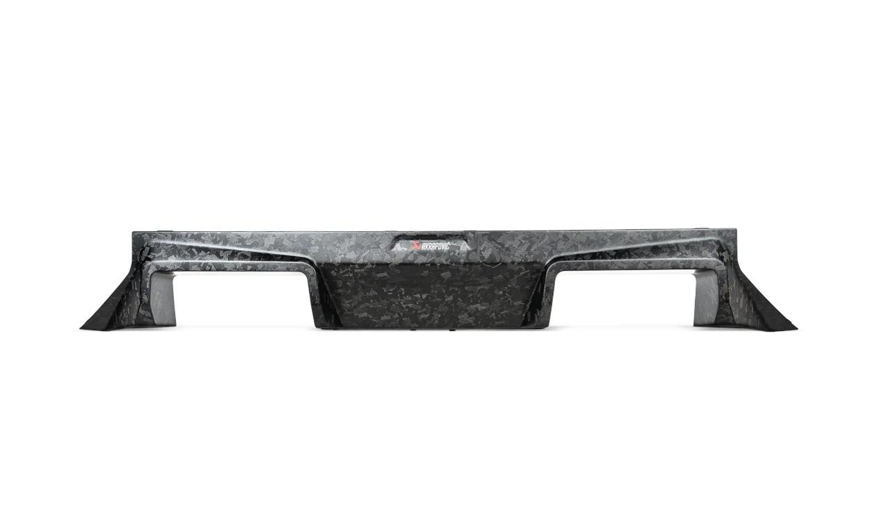 https://cdn.leebmann24.com/products/4/f/6/b/4f6bd4b8b61528d19e7e819e72137db486bd1852_AKR_Rear_Chopped_Carbon_Fibre_Diffuser_DI_BM_CA_10_CF.jpg