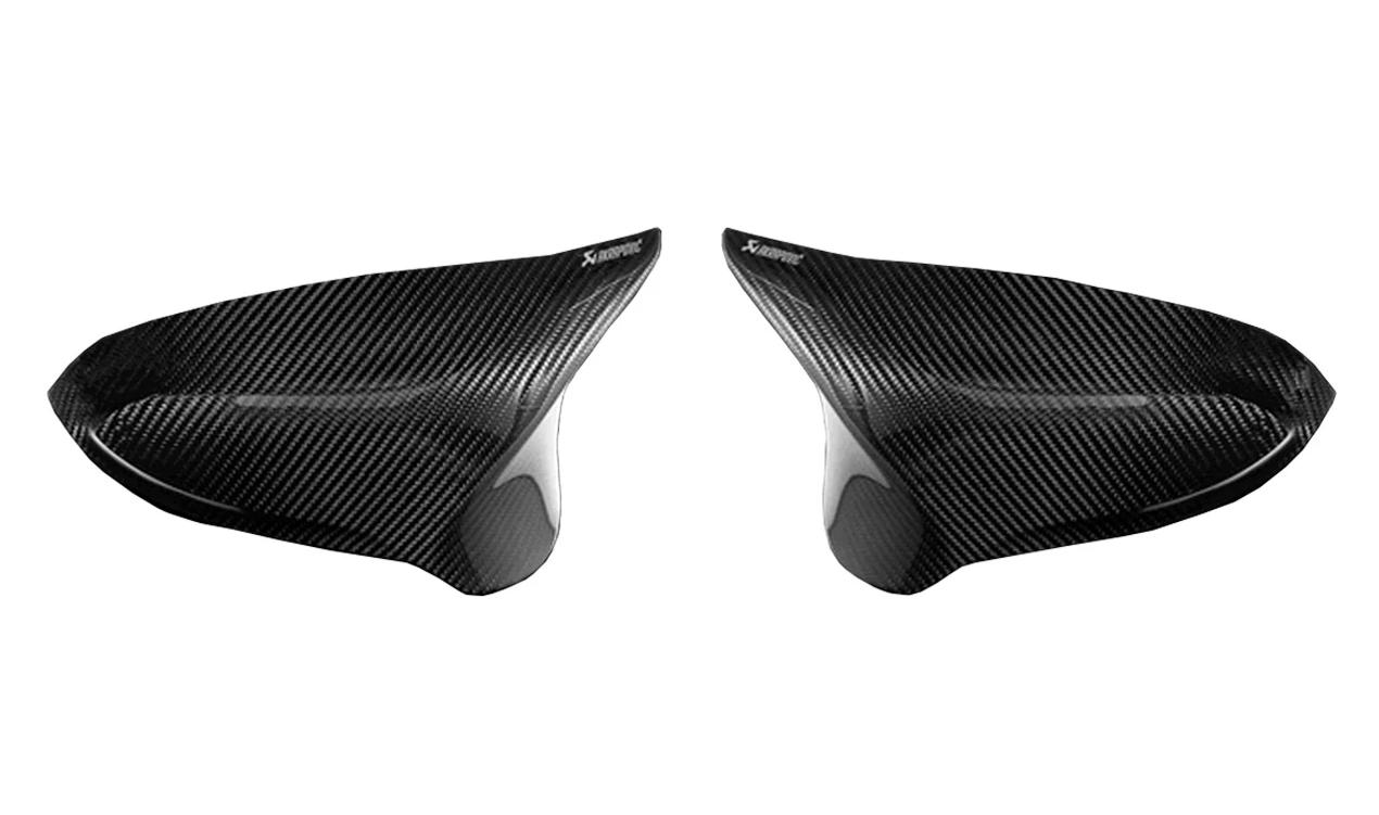 https://cdn.leebmann24.com/products/f/a/f/1/faf170bb5a90de201c2fa5cc579a774ea2f29d82_akrapovic_carbon_fiber_mirros_cap_set_wm_bm_ca_2_g_1.jpg